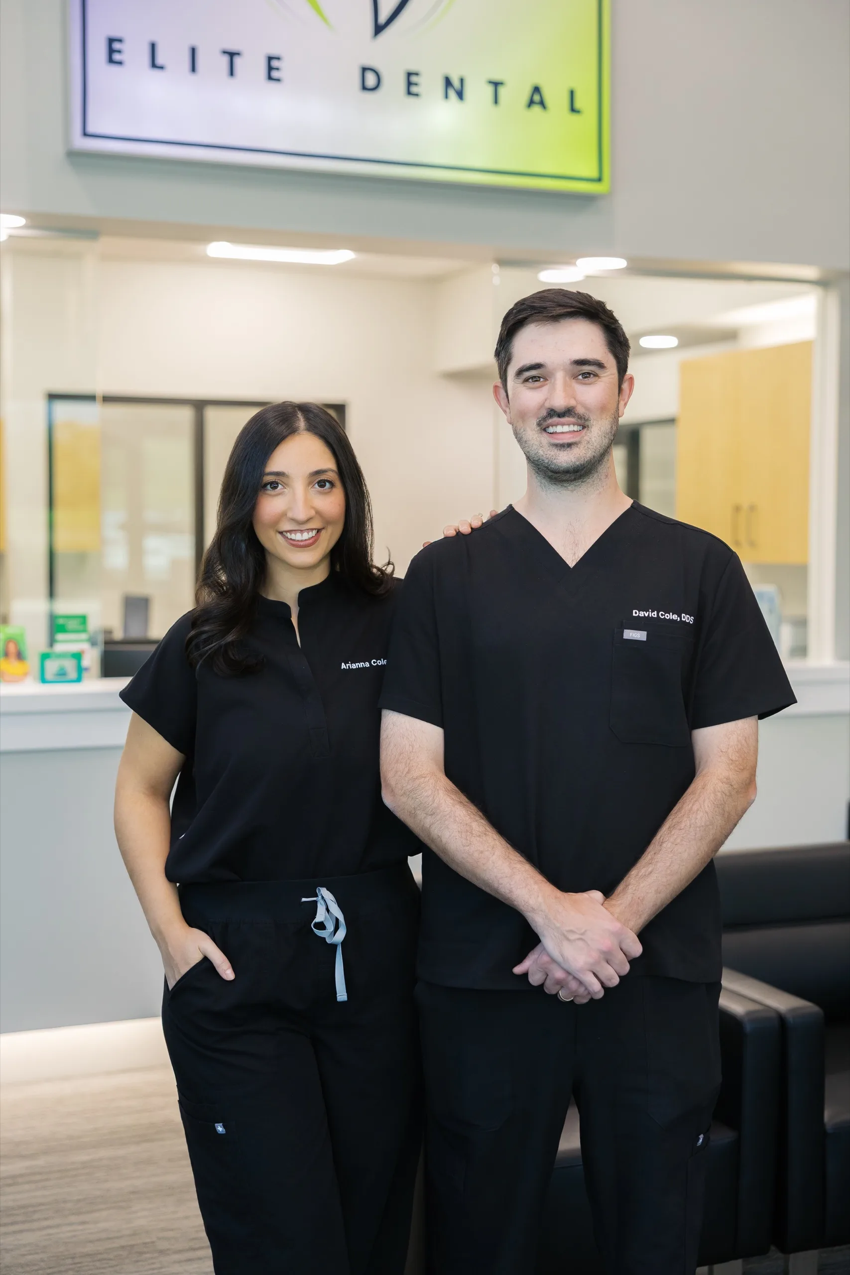 Dr. Arianna Cole and Dr. David Cole welcoming new patients at Elite Dental.